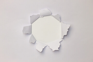 Torn white paper in the center in the shape of a circle