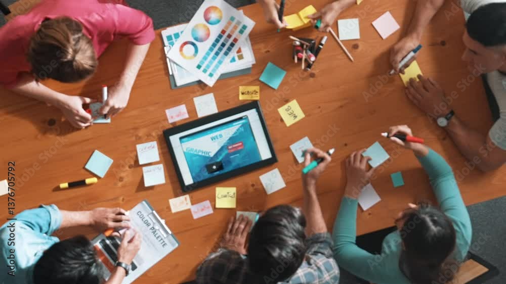 Poster top view of skilled business people working together to design web design. aerial view of designer b