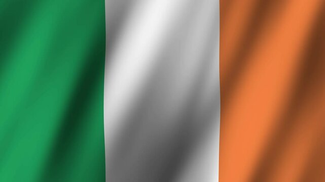 Irish flag waving gracefully in the breeze during a clear sunny day in a vibrant outdoor setting