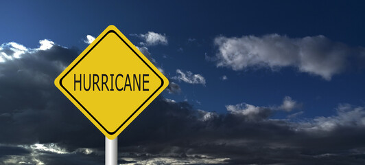  danger,caution,Hurricane Idalia warning sign against a powerful stormy background with copy space. Dirty and angled sign with cyclonic winds add to the drama.hurricane season sign on cloudy backgroun