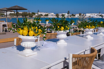 Wedding tables by the sea in Pollonia, Greece