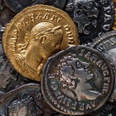A treasure of Roman gold and silver coins.Trajan Decius. AD 249-251. AV Aureus.Ancient coin of the...