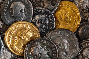 A treasure of Roman gold and silver coins.Trajan Decius. AD 249-251. AV Aureus.Ancient coin of the...