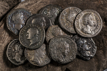 A treasure of Roman gold and silver coins.Trajan Decius. AD 249-251. AV Aureus.Ancient coin of the...