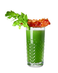 Glass of green bloody mary cocktail with bacon and celery on white background