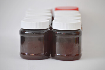 Variety of Containers with Natural Liquids from Mexico (Honey and Others)