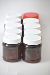 Variety of Containers with Natural Liquids from Mexico (Honey and Others)