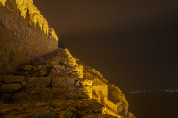 The monumental staircase of Palamidi fortress illuminated during night time, Argolis, Peloponnese, Greece.