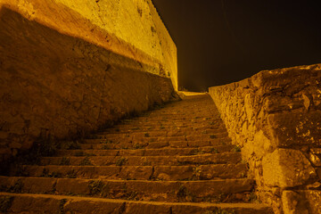 The monumental staircase of Palamidi fortress illuminated during night time, Argolis, Peloponnese, Greece.