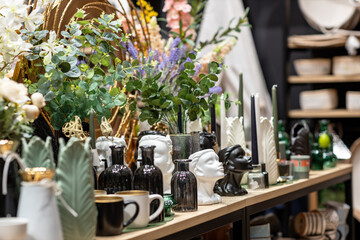 Household items in the gift department on the shelves of the shopping center.