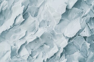 Obraz premium A breathtaking view of the Arctic Ocean's vast sea ice. The sunlight dances on the intricate and mesmerizing formations of ice, creating a spectrum of color that highlights the stark beauty of this