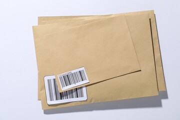 Different paper envelopes on white background, top view. Post office