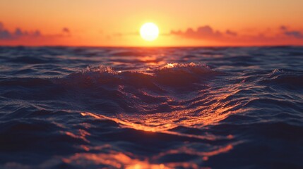 Sun low in sky reflecting on rippling water.