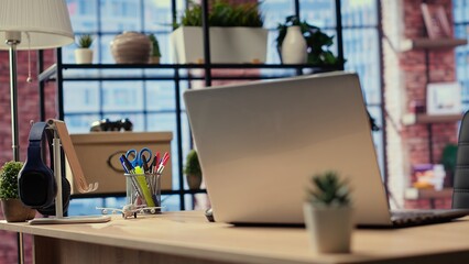 Empty apartment featuring a modern and minimalist interior with wooden floors, bright walls and a...