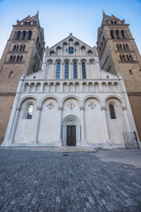 Obraz premium Cathedral in Pecs town in Hungary, Europe. Imposing cathedral facade with towering twin bell towers, showcasing intricate architecture and historical significance.