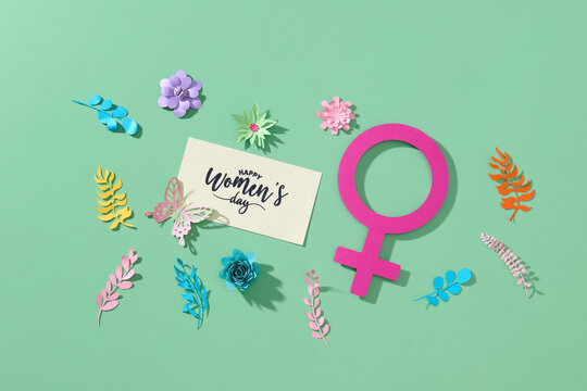March 8 women's day greeting text with female symbol and paper