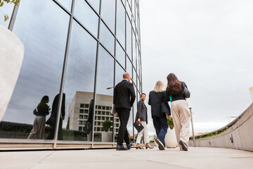 diverse group working in offices during an outing