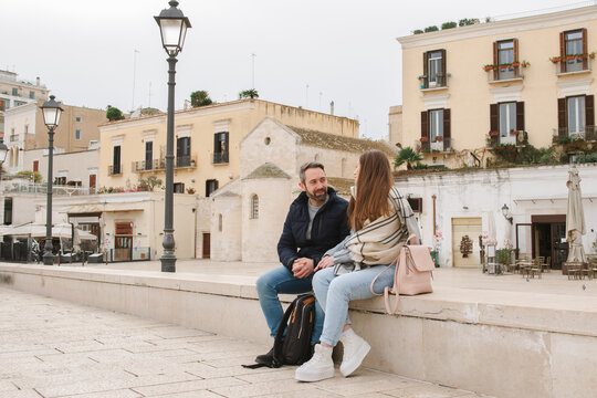 Happy couple on a romatic date at the street of Bari
