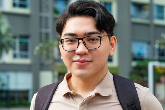  Portrait of a young man in cityscape