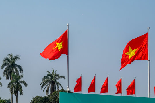  Vietnamese Flags Waving Against Blue Sky