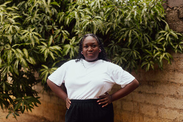 Black woman with her hands on her hips