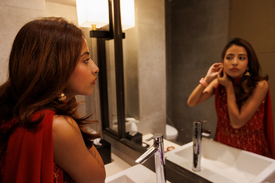 Young woman getting ready in the bathroom