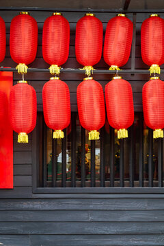 Traditional Chinese Lanterns Against Dark Wood