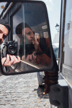 Reflection Shot in Vehicle Mirror