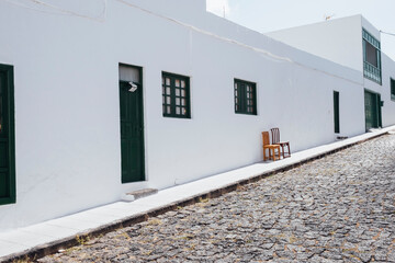 Minimalist Chairs by White Wall