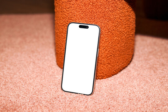 Phone Mockup with white screen in Creative Office Setup