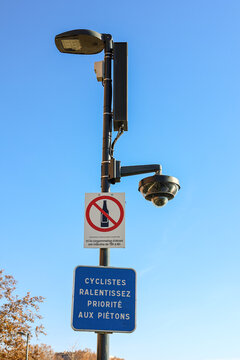 French Street Pole with light signs and Surveillance Camera  