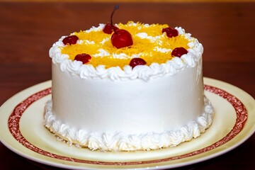 Classic Marta Rocha cake pie developed in honor of Miss Brazil made with egg thread, baba de moça, walnuts, cherry and dried plum