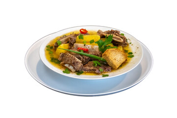 Traditional rustic Brazilian soup known as vaca atolada, prepared with cassava and beef ribs