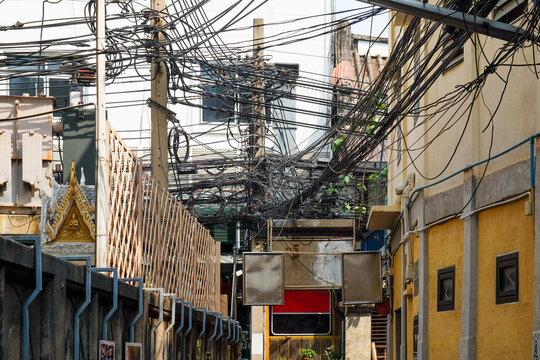 Overhead Chaos: Tangled Electrical Wires