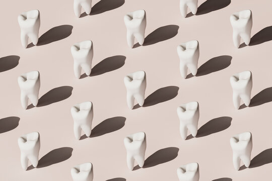 3D render of multiple molar teeth in a pattern