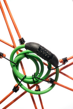 Green Cable Lock Suspended by Orange Ropes