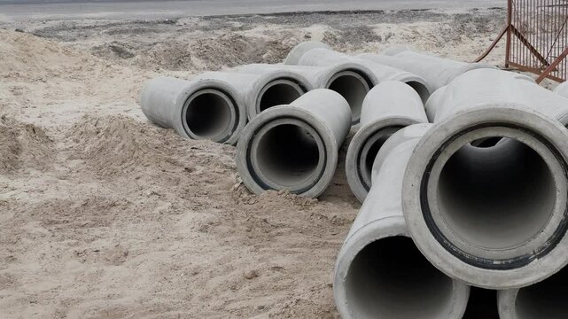 Concrete pipes on a road under construction