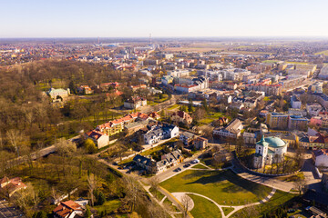 Fototapeta premium Aerial view of modern landscape of Polish town of Skierniewice on spring day, Lodz Voivodeship