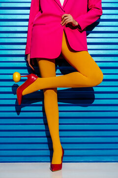 Fashionable Woman Balancing Lemon on Heel