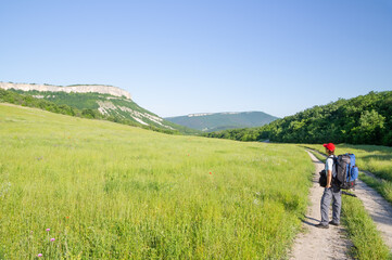 Man tourist in mountains..