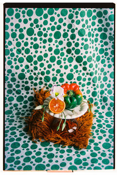 Creative arrangement of colorful vegetables on a textured surface