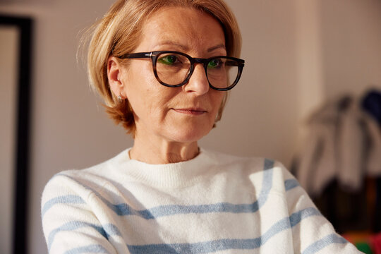 Concentrated woman engaged in remote work