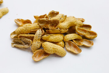 Peanut shells on white background.
