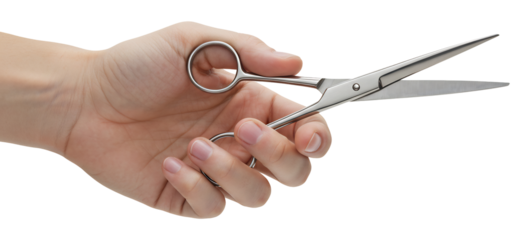 輝くハサミを持つ手