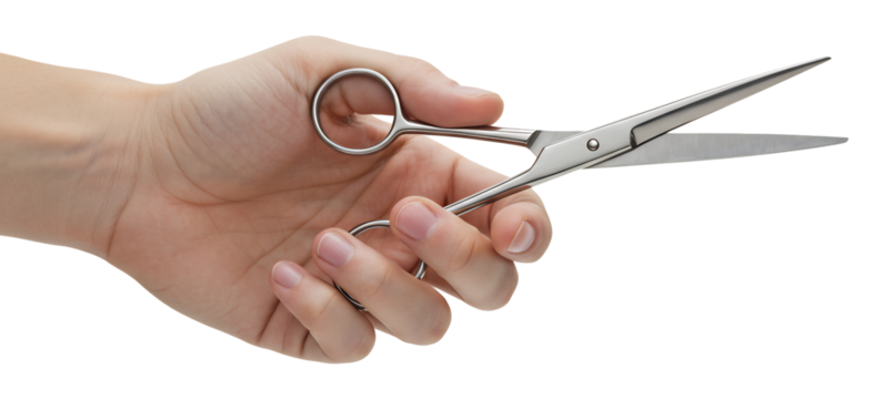 輝くハサミを持つ手
