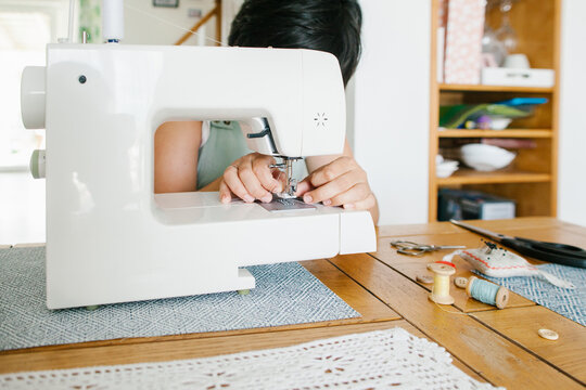 Female seamstress at work.