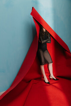 Creative Fashion Concept with Red Fabric and Minimalist Design E