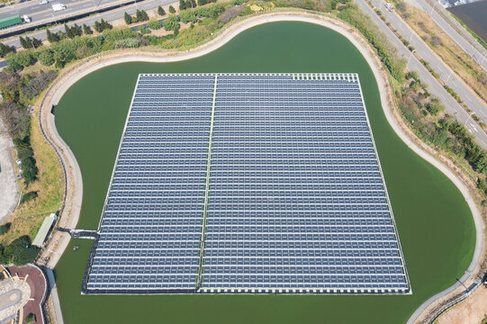 Aerial View of Floating Solar Panel Installation on Water