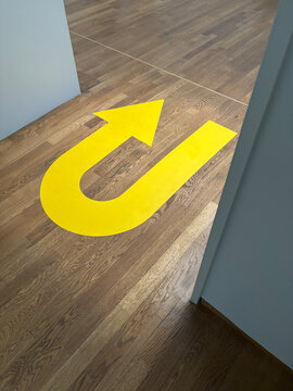 yellow arrow on floor