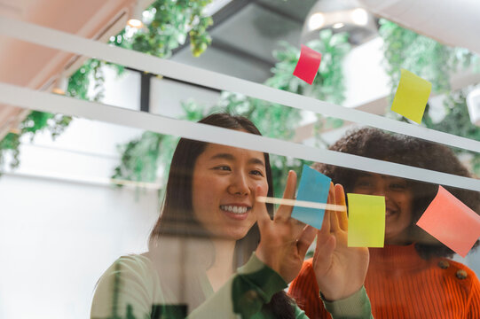 Brainstorming session with sticky notes in a modern office